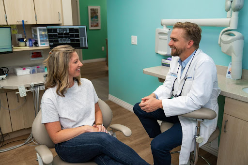 Dentist with patient